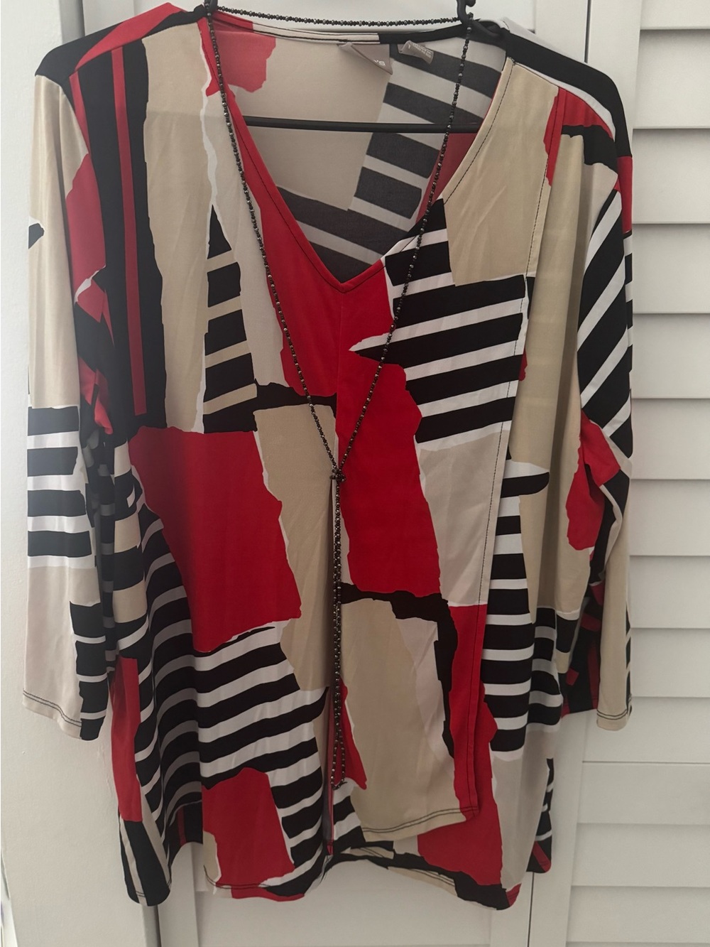 Chico's Red, Black & Cream Abstract V-Neck Tunic. Size 3 equivalent to XL.